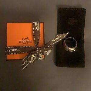 Silver men’s Hermès ring.